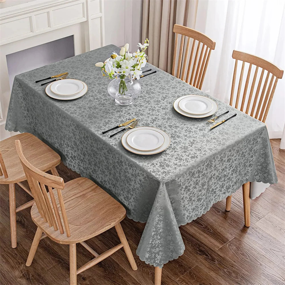 Nappe anti-tâche en polyester enduit gris motif fleuri