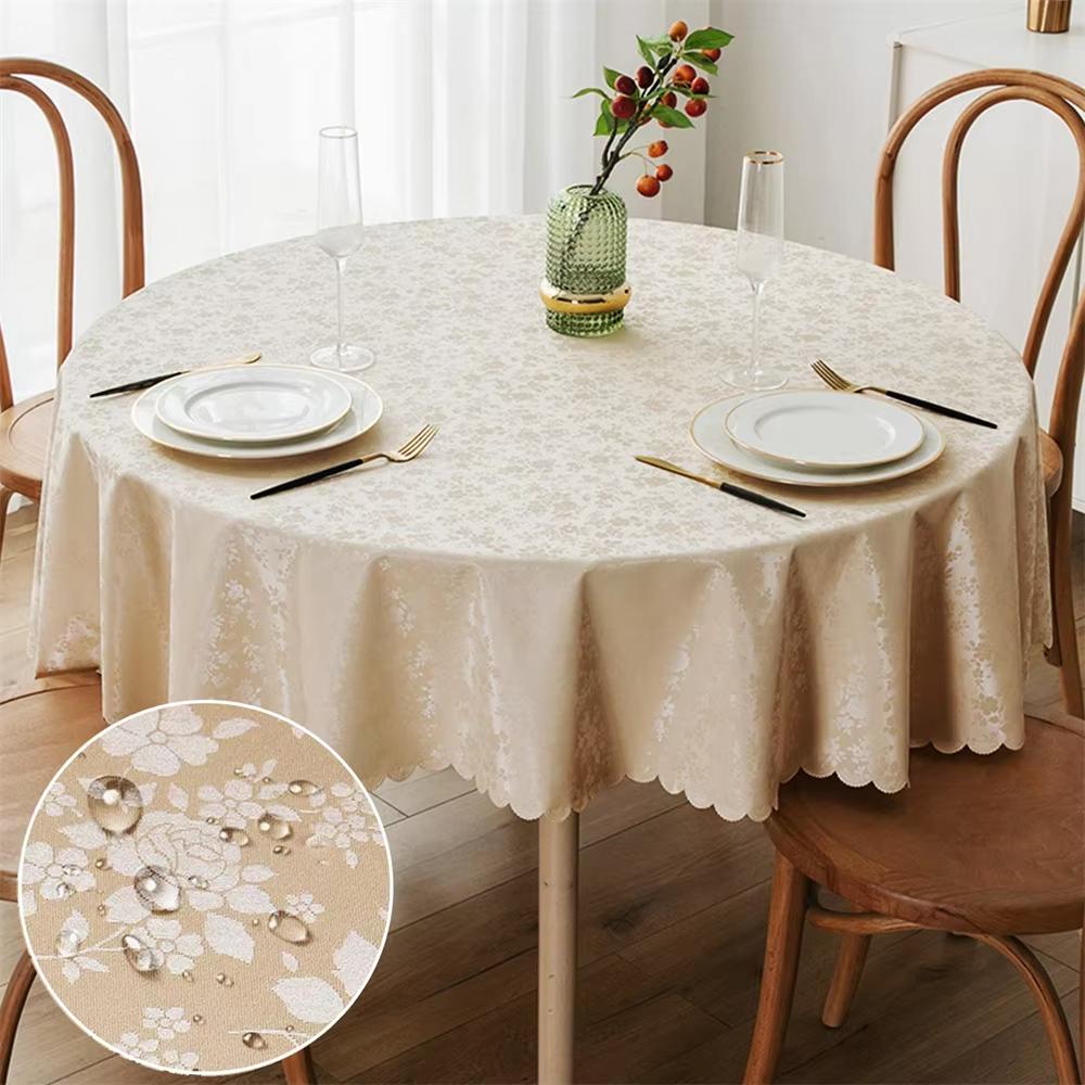Nappe anti-tâche ronde en polyester enduit motif fleuri