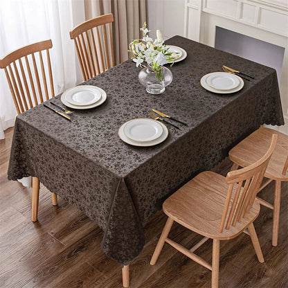 Nappe anti-tâche en polyester enduit marron motif fleuri