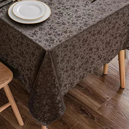 Nappe anti-tâche en polyester enduit marron motif fleuri