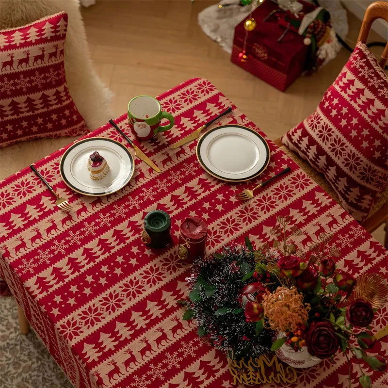 Nappe de Noël Jacquard en polycoton rouge motif Sapins et rênes pampilles
