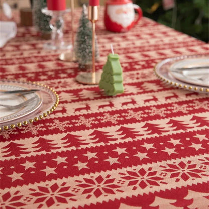 Nappe de Noël Jacquard en polycoton rouge motif Sapins et rênes pampilles